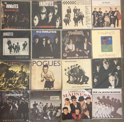a lot of vinyl records on the table