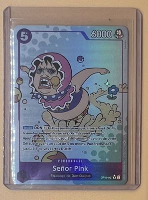 une photo d'une carte Pokémon représentant un chien en combinaison spatiale