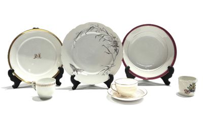 four plates and a cup on the table