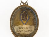 une image représentant une médaille d'or sur laquelle figure le portrait d'une femme