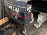a motor that is sitting on a wooden pallet