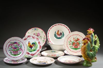 a lot of plates and bowls that are sitting on a table