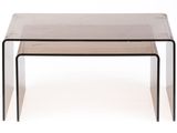 a clear glass table with two black legs and a clear top