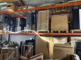 a room with a lot of boxes and boxes on the shelves