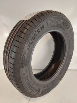 a close up of a tire on a white surface