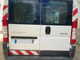 a white van parked on the side of the road