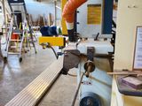 a picture of a machine that is working on a piece of wood