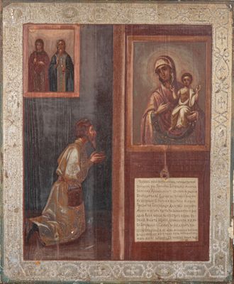 un vieux tableau représentant une femme agenouillée à côté d'un tableau représentant un homme