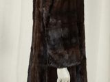 an image of a woman ' s fur coat on a mannequin