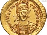 an image of a gold coin with an image of a woman on it