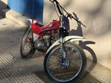 a motorcycle that is parked on the side of the street