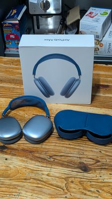 a box with a pair of headphones and a pair of blindfolds