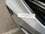 a close up of a sticker on the front of a car
