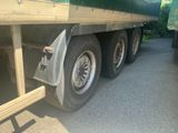 a truck that is parked on the side of the road