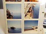 a picture of a picture of a boat on the water