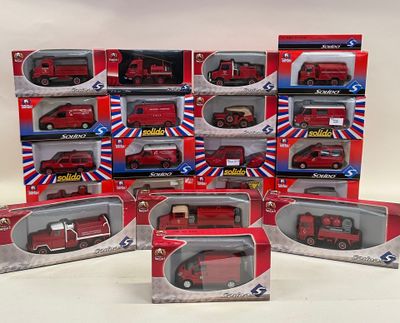 six boxed red toy trucks in a display case