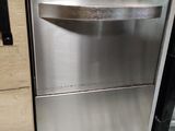 a stainless steel dishwasher inside of a kitchen
