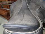 a close up of a saddle on a bicycle