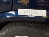 a sticker that says vauto on the back of a car