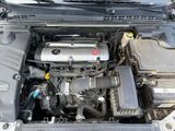 the engine of a car with its hood open and the hood open
