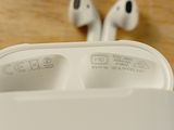 two airpods that are sitting on top of a table