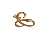 an image of a close up of a gold ring with a snake on it