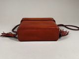 leather cross body bag with tassels