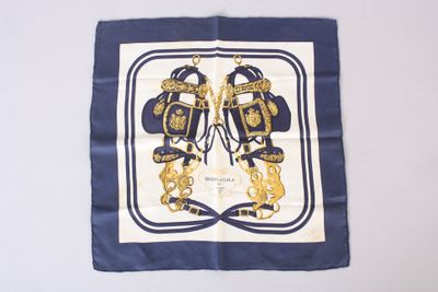 blue and white square scarf with a picture of a pair of purses on it