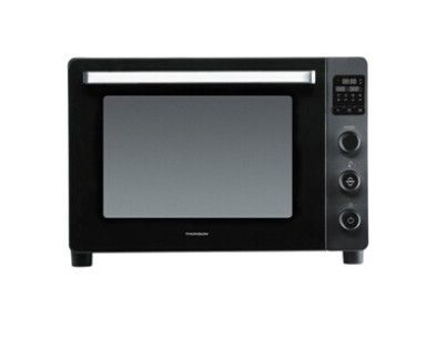 un petit four à micro-ondes noir sur fond blanc