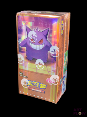 une boîte contenant une figurine de Pokémon