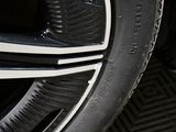 a close up view of a tire on a car