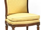 an image of a pair of chairs with a yellow upholstered seat