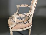 an image of a chair with a blue and white design on it