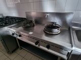 an image of a commercial kitchen with stainless steel appliances