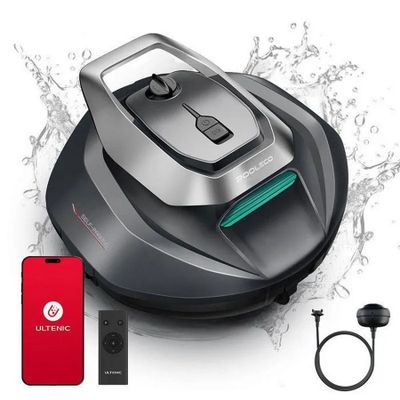 un gros plan d'un aspirateur avec un téléphone rouge à côté
