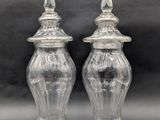 pair of clear glass salt and pepper shakers