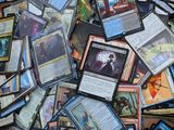 many different types of cards scattered on top of each other