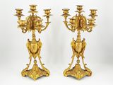 pair of antique brass candelabs