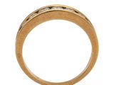 a close up of a gold ring with diamonds on a white background