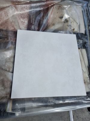 a piece of paper sitting on top of a piece of plastic