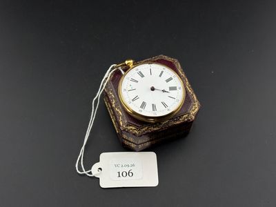 a small box with a clock on top of it