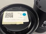a cup of coffee and a cup of coffee with a qr code on it