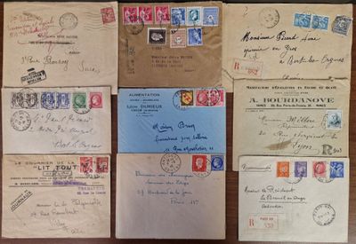 several old envelopes with stamps on them sitting on a table