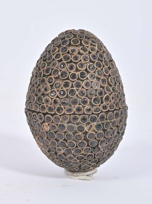 an image of a decorative egg on a white surface