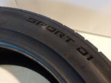 the tire of a car that is sitting on the floor