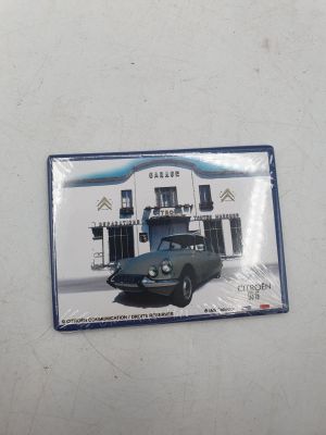 a picture of a picture of a car in front of a building