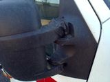 an image of a side view mirror of a truck