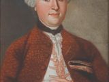 portrait of a man in a red coat and white shirt holding a feather