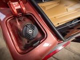 a close up of a car ' s interior with the door open