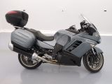 a motorcycle that is parked on the floor in a room